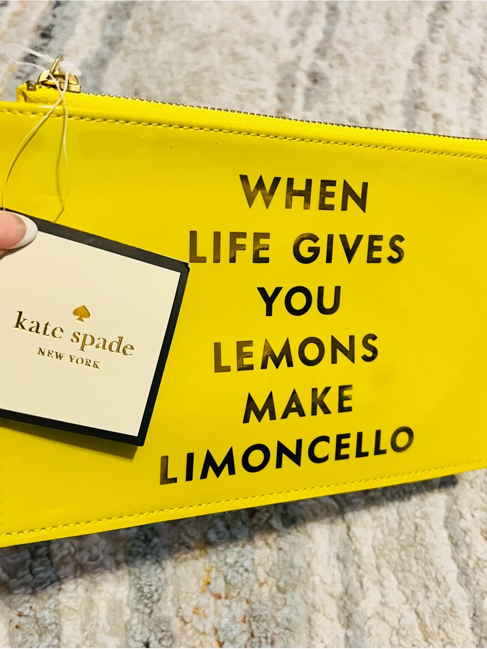 kate spade glossy yellow zip pouch.        NWT